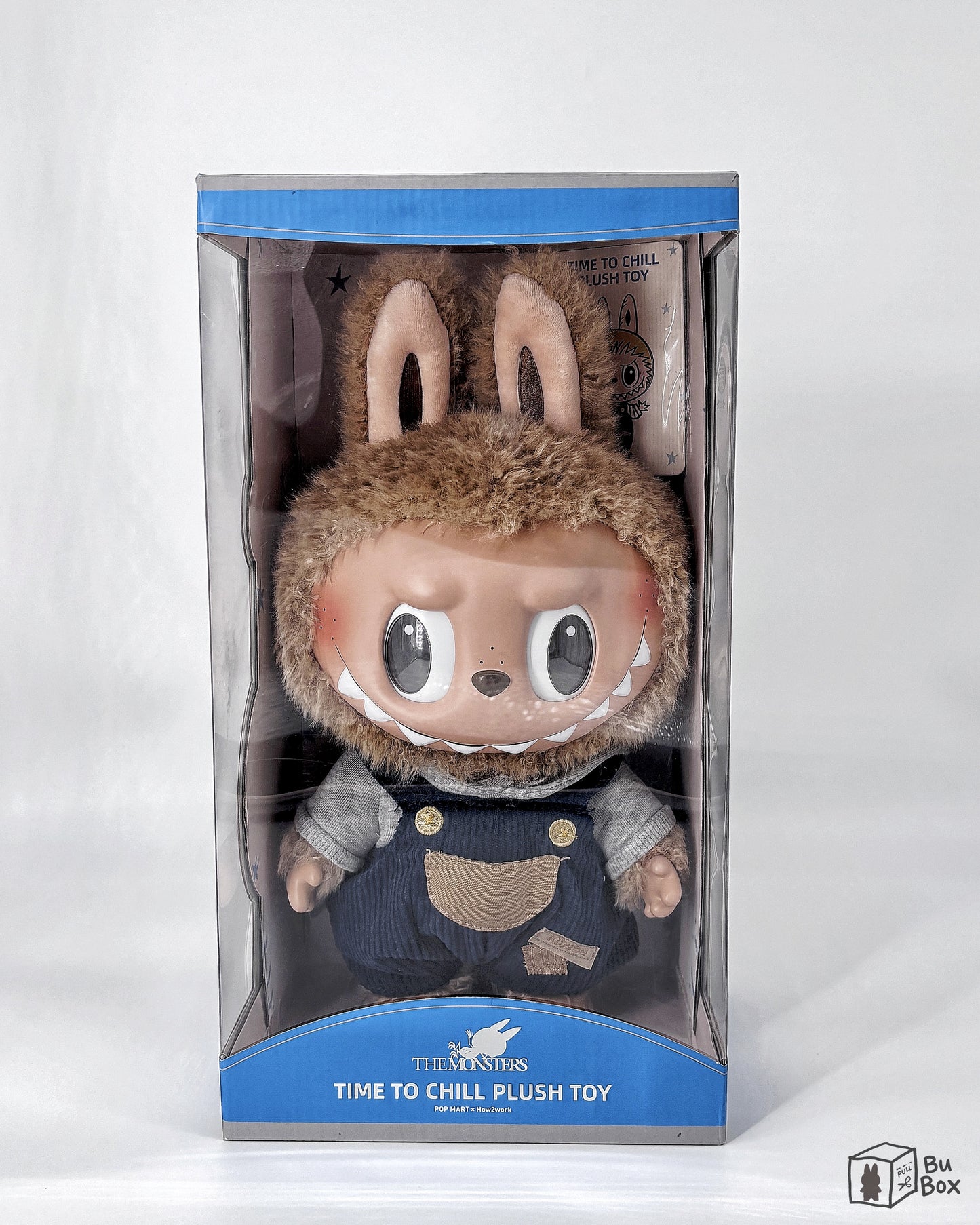 THE MONSTERS Labubu Time to Chill Vinyl Plush Doll featuring a relaxed Labubu character in a chill pose, perfect for fans and collectors of Labubu's cozy and playful design.