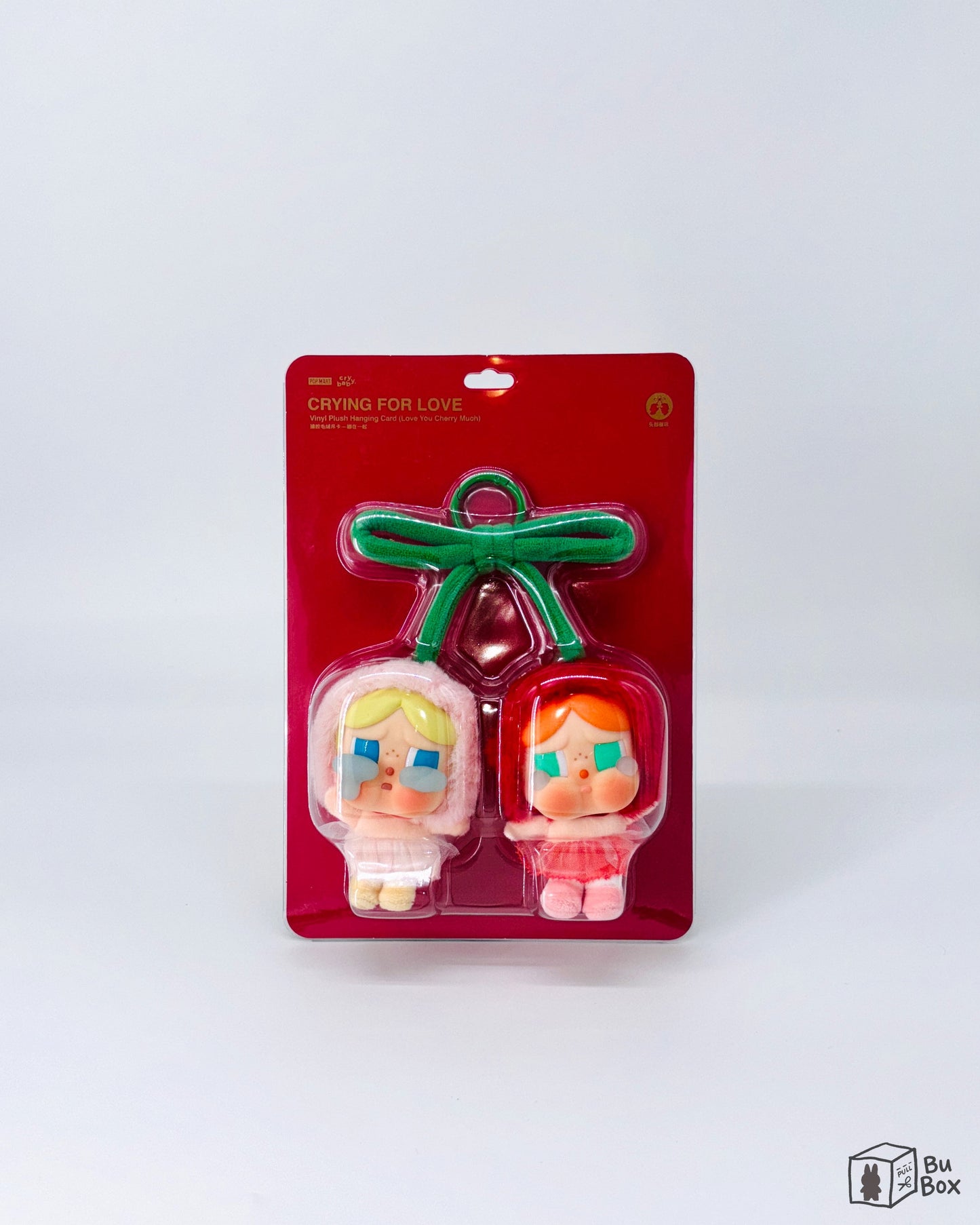 CRYBABY Crying For Love Series Vinyl Plush Hanging Card (Love You Cherry Much) featuring a soft vinyl plush pendant with a charming "Love You Cherry Much" design, perfect for collectors and fans of the Crying For Love series.