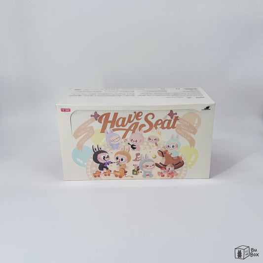 THE MONSTERS Labubu Have a Seat Vinyl Face Sealed Case (6 Blind Boxes) featuring a collection of collectible Labubu figures in a sitting pose with a charming Vinyl Face design, perfect for fans and collectors of Labubu's adorable style.