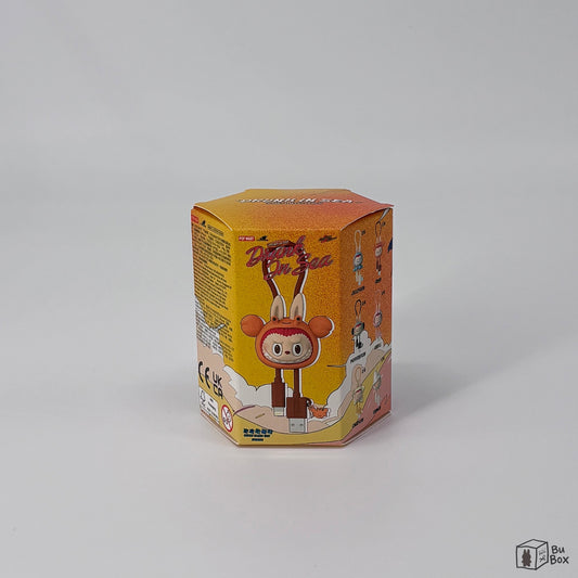 THE MONSTERS Labubu Drunk in Sea Series Phone Cable Single Blind Box featuring a collectible Labubu phone cable with a fun and whimsical design, perfect for fans of Labubu's quirky style and ocean-inspired theme.