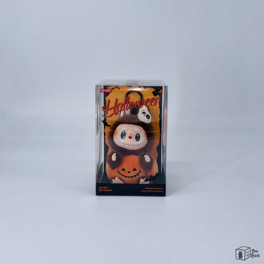 THE MONSTERS Labubu Happy Halloween Party Series Sitting Pumpkin Vinyl Plush Pendant featuring a cute Labubu character sitting on a pumpkin, perfect for Halloween decorations and Labubu collectors.